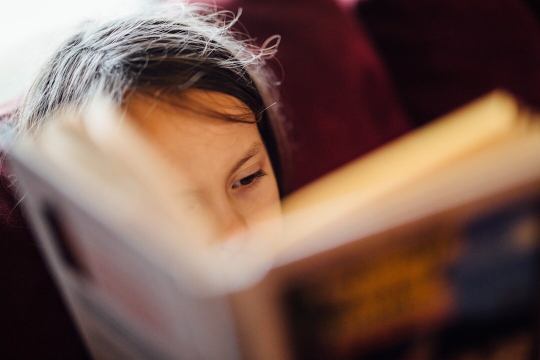 person reading mystery book