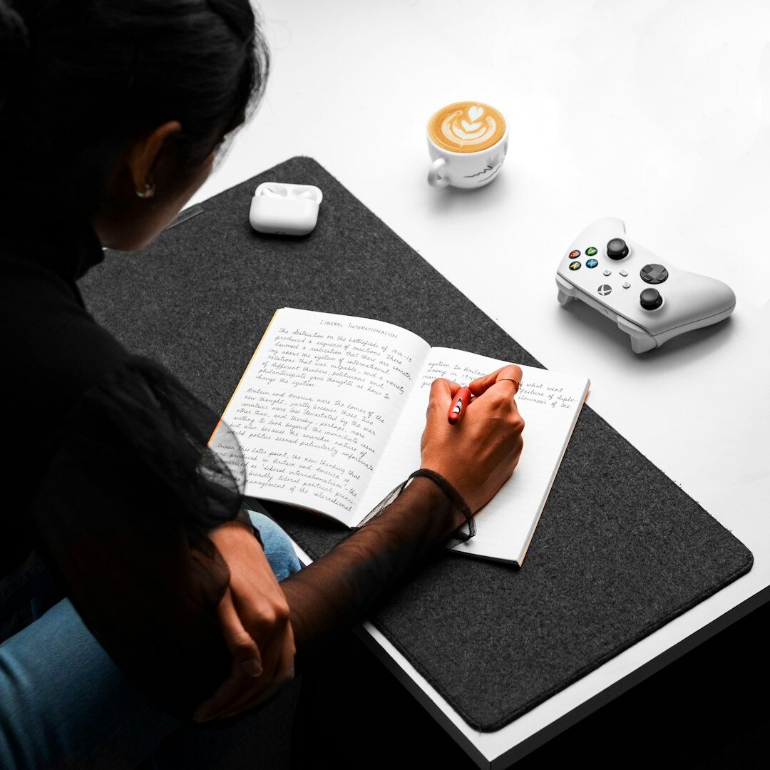 writer at desk with notebook
