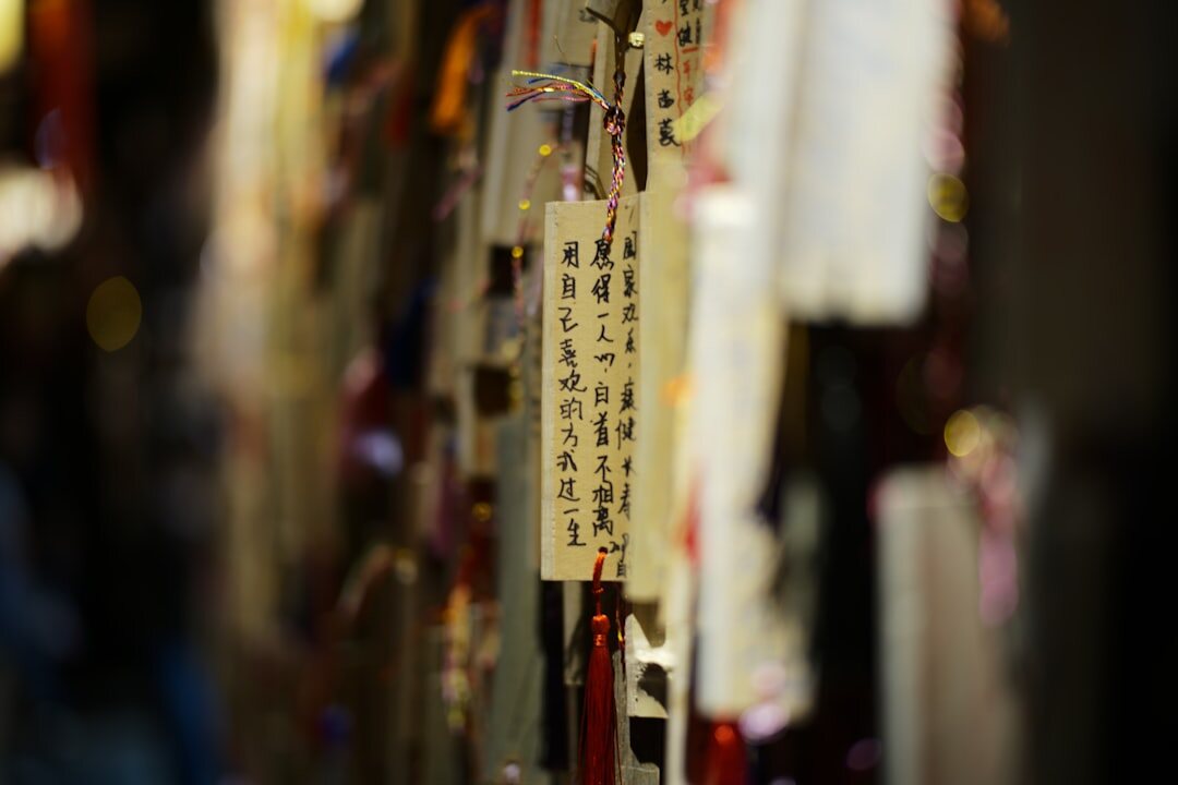 Investigation board with pinned photographs and red string connections